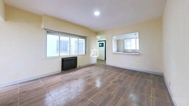 Av-Almirante-Brown-1127-Living-Room-Defurnished.jpg