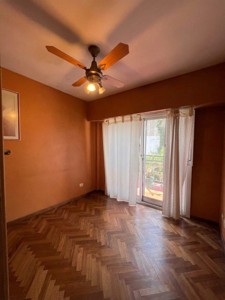 dormitorio principal con patio vacío.jpeg